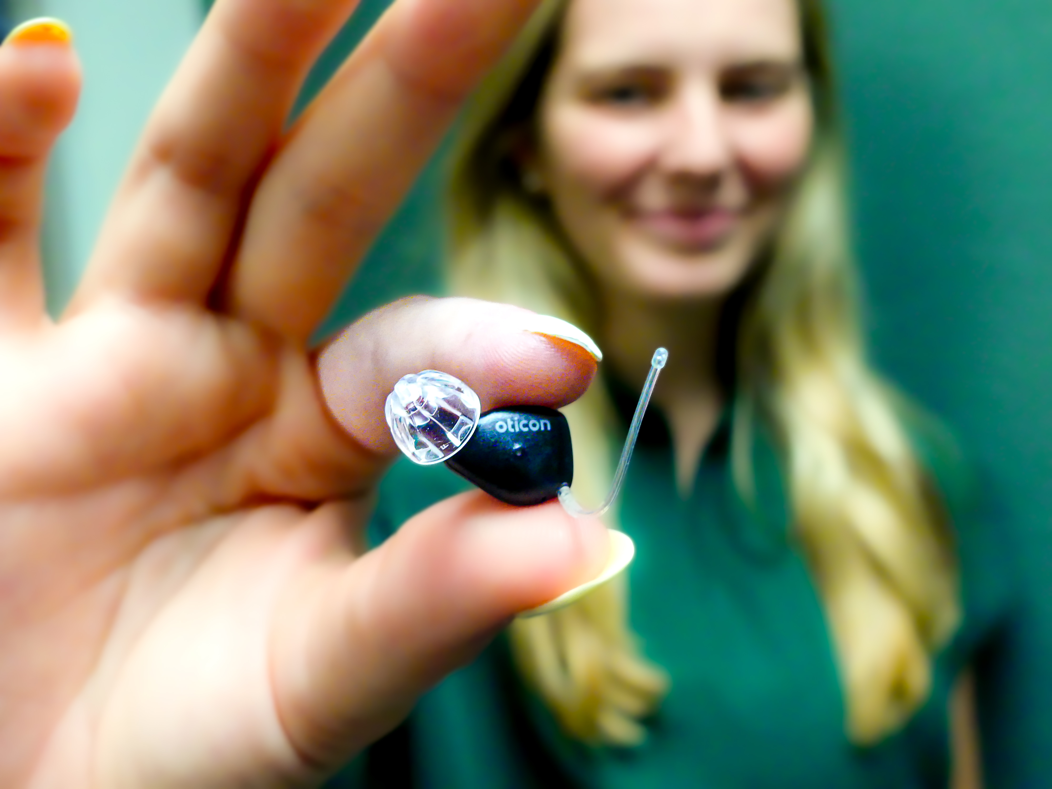 Oticon Zeal in-the-ear hearing aid available at Hooter Hearing in Waco TX - nearly invisible rechargeable hearing aid